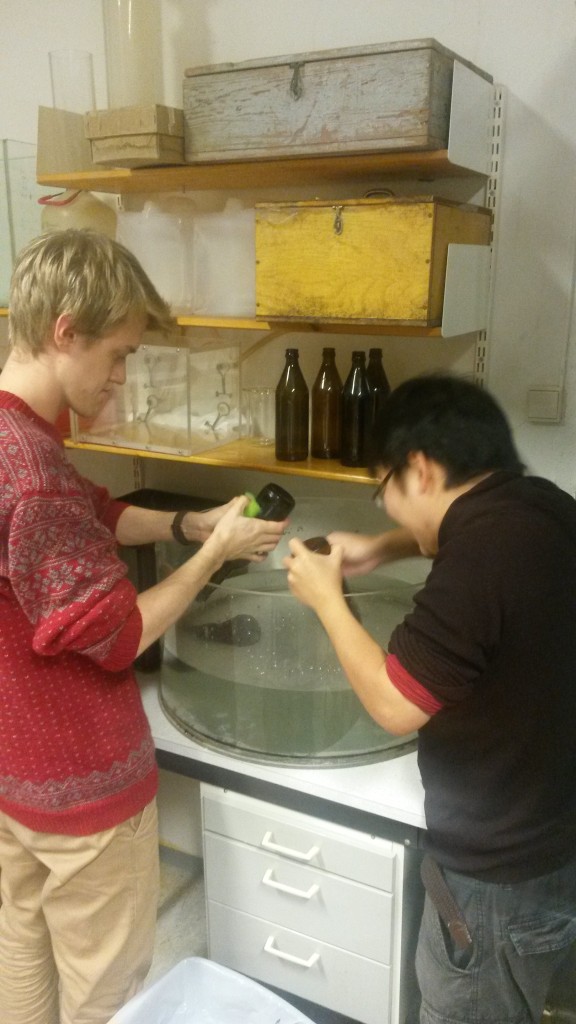 Håvard and Fumiaki cleaning bottles